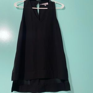 Jennifer Lopez black no sleeve dress blouse